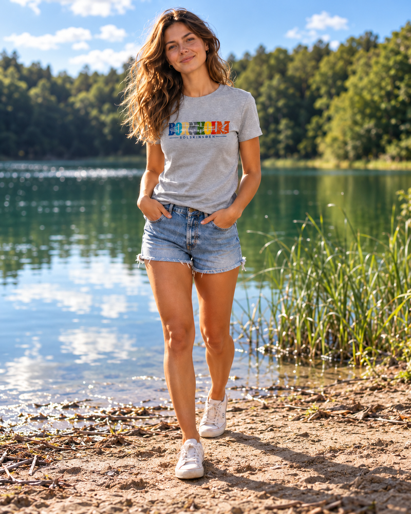 Woman wearing Bornholm clothing by a lake